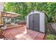 View of the backyard featuring shed, patio and gazebo at 2700 White Blossom Ln, Suwanee, GA 30024