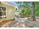 Spacious backyard deck area with room for outdoor dining and relaxation, surrounded by mature trees at 2700 White Blossom Ln, Suwanee, GA 30024