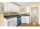 Kitchen with granite countertops, stainless steel appliances, and beautiful backsplash at 2700 White Blossom Ln, Suwanee, GA 30024