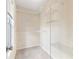 View of an organized walk-in closet with plenty of storage at 2700 White Blossom Ln, Suwanee, GA 30024