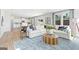 Bright and open living room with stylish furniture and hardwood floors at 5595 Rosehall Pl, Atlanta, GA 30349