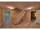 Basement with a staircase, wood-look flooring, and recessed lighting offering a versatile space at 535 Toonigh Rd, Woodstock, GA 30188