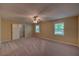 Spacious bedroom with a ceiling fan, neutral carpet and ample natural light at 535 Toonigh Rd, Woodstock, GA 30188