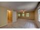 Bright bedroom featuring neutral carpet and multiple windows providing abundant natural light at 535 Toonigh Rd, Woodstock, GA 30188