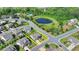 Aerial view of a house with well-maintained yard, close to a pond and green space at 7575 Old Camp Lndg, Cumming, GA 30040