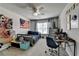 Bright bedroom with a ceiling fan, window with blinds, and a gray color scheme at 7575 Old Camp Lndg, Cumming, GA 30040