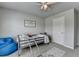 Neutral toned bedroom with a twin bed and a window with view at 7575 Old Camp Lndg, Cumming, GA 30040