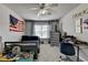 Bright bedroom with a ceiling fan, window with blinds, and a gray color scheme at 7575 Old Camp Lndg, Cumming, GA 30040