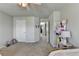 Spacious bedroom with carpet flooring, neutral paint color, and views of the hallway at 7575 Old Camp Lndg, Cumming, GA 30040