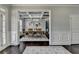 Elegant dining room with coffered ceiling and modern chandelier at 7575 Old Camp Lndg, Cumming, GA 30040