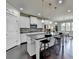 Modern kitchen featuring a large island, stainless steel appliances, and ample cabinet space at 7575 Old Camp Lndg, Cumming, GA 30040