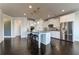 Spacious kitchen with a large island, stainless steel appliances, and sleek white cabinetry at 7575 Old Camp Lndg, Cumming, GA 30040