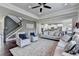 Spacious living room offering an open floor plan and staircase access at 7575 Old Camp Lndg, Cumming, GA 30040