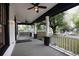 Spacious front porch with ceiling fans offering a relaxing outdoor space at 1120 Arlington Sw Ave, Atlanta, GA 30310
