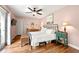 Bedroom with wood flooring, ceiling fan, and ample natural light at 2364 Woodside Way, Atlanta, GA 30341