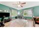 Spacious bedroom with hardwood floors, natural light, and entertainment area at 2364 Woodside Way, Atlanta, GA 30341