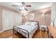 Comfortable bedroom featuring hardwood floors, two closets, and window with natural light at 2364 Woodside Way, Atlanta, GA 30341