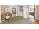 Bedroom featuring wood flooring, laundry closet, vanity, and views to the kitchen at 2364 Woodside Way, Atlanta, GA 30341