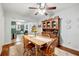 Dining room with hardwood floors and a light-wood table set for six at 2364 Woodside Way, Atlanta, GA 30341
