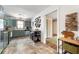 Bright kitchen with ample cabinetry, stainless steel appliances and access to other rooms at 2364 Woodside Way, Atlanta, GA 30341