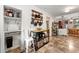 Open kitchen with butcher block island and breakfast bar featuring connection to dining area at 2364 Woodside Way, Atlanta, GA 30341
