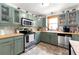 Charming kitchen featuring ample cabinetry, stainless steel appliances, and butcher block countertops at 2364 Woodside Way, Atlanta, GA 30341