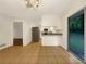Bright dining area with tile floors, white walls, and sliding glass doors to the backyard at 4261 E Conley Rd, Conley, GA 30288