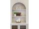Close up of built in shelving unit with decor at 818 Forest Path Ln, Alpharetta, GA 30022