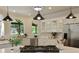 Modern kitchen featuring a gas cooktop, stainless steel appliances, and ample counter space at 818 Forest Path Ln, Alpharetta, GA 30022