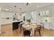 Bright eat-in kitchen featuring a center island with seating and modern appliances at 818 Forest Path Ln, Alpharetta, GA 30022