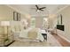 Comfortable main bedroom with a plush bed, tray ceiling, and stylish decor and furnishings at 818 Forest Path Ln, Alpharetta, GA 30022