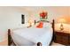 Well-lit bedroom features a bed and two side tables at 10202 Fairington Ridge Cir, Lithonia, GA 30038