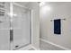 Bright walk-in shower has a glass enclosure and towel bar at 2012 Ellison Nw Way # 15, Kennesaw, GA 30152