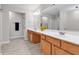 Bright bathroom features double sink vanity, soaking tub, and glass enclosed shower at 2012 Ellison Nw Way # 15, Kennesaw, GA 30152