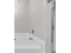 A bright white bathtub shows faucet and glass-enclosed shower at 2012 Ellison Nw Way # 15, Kennesaw, GA 30152