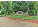 Community sign at Waterside Ellison Lakes surrounded by lush landscaping and mature trees at 2012 Ellison Nw Way # 15, Kennesaw, GA 30152