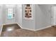 Open foyer area with neutral paint, access to other rooms, and carpeted floors at 2012 Ellison Nw Way # 15, Kennesaw, GA 30152