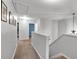 Upstairs hallway with carpet flooring and access to bedrooms and bathrooms at 2012 Ellison Nw Way # 15, Kennesaw, GA 30152