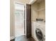 Convenient laundry room with washer, dryer, and bathroom access at 2074 Hilburn Se Dr, Atlanta, GA 30316