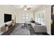 Cozy living room with modern decor, hardwood floors, and plenty of natural light at 2074 Hilburn Se Dr, Atlanta, GA 30316