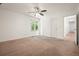 Spacious bedroom has a ceiling fan and window, carpet flooring at 2900 Country Nw Ct, Kennesaw, GA 30152