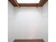 Walk-in closet features shelving and a carpet floor at 2900 Country Nw Ct, Kennesaw, GA 30152