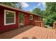 Exterior wooden deck and railing provides outdoor relaxation space with access to backyard at 2900 Country Nw Ct, Kennesaw, GA 30152