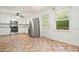 Bright kitchen features white cabinets, stainless steel appliances, and eat in kitchen dining at 2900 Country Nw Ct, Kennesaw, GA 30152