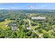 Aerial view of Auburn, Georgia, neighborhood with mature trees and a convenient storage shed at 483 Glen Terrace Rd, Auburn, GA 30011