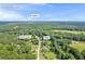 Panoramic aerial view of home and neighborhood near Rock Creek in Auburn, Georgia with mature trees at 483 Glen Terrace Rd, Auburn, GA 30011
