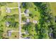Aerial view of home and yard with shed in Auburn, Georgia on a 0.63 acre lot at 483 Glen Terrace Rd, Auburn, GA 30011