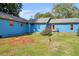 Home exterior showcasing a serene backyard with a patio area, perfect for outdoor relaxation at 483 Glen Terrace Rd, Auburn, GA 30011