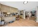 Open kitchen and living area with a breakfast bar and wood flooring at 483 Glen Terrace Rd, Auburn, GA 30011