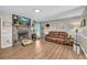 Cozy living room with a stone fireplace and a comfortable leather sofa at 483 Glen Terrace Rd, Auburn, GA 30011